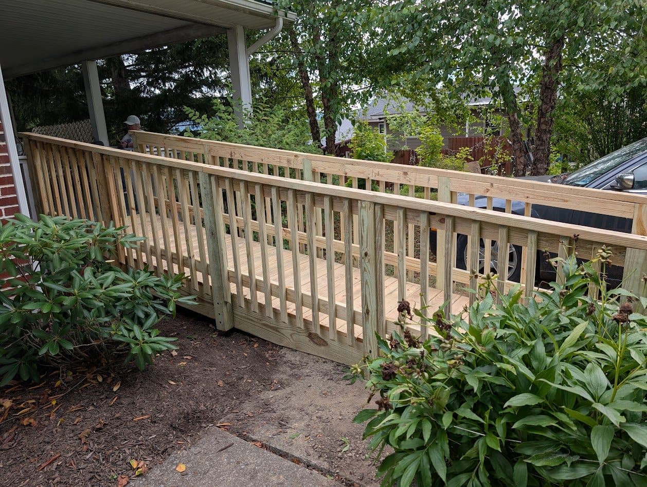 Side view of the ramp showing the framing and full-length handrails